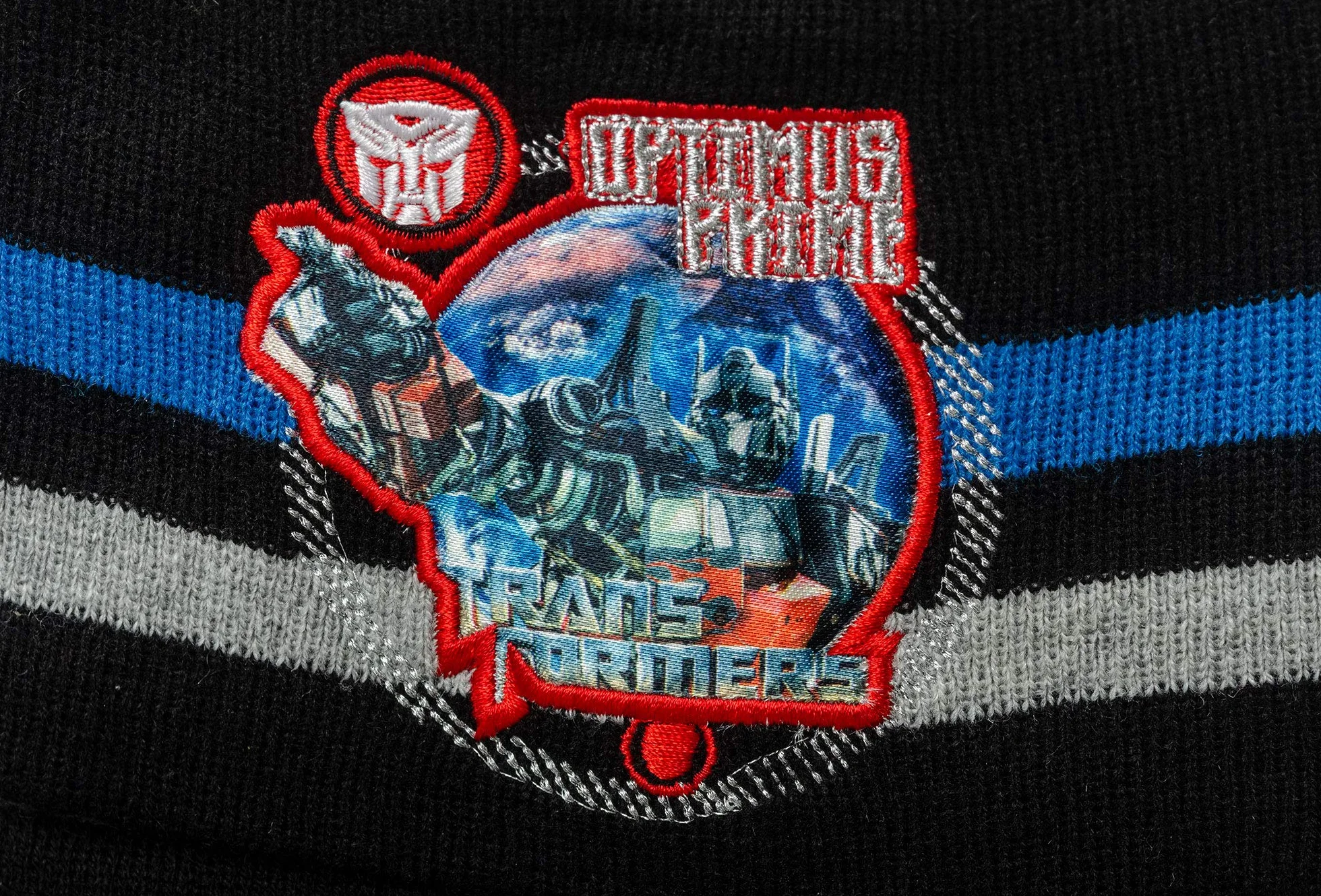 Transformers Autobot Optimus Prime zestaw 2-częściowy składający się z czapki zimowej i szalika dla dzieci, chłopców, rozmiar 52 lub 54 w kolorze niebieskim lub czarnym