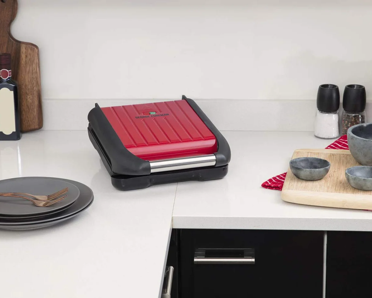 George Foreman grill elektryczny, redukujący ilość tłuszczu, wyjmowane płyty z powłoką nieprzywierającą, ruchome zawiasy, moc 1200W, czerwony, Steel Compact 25030-56