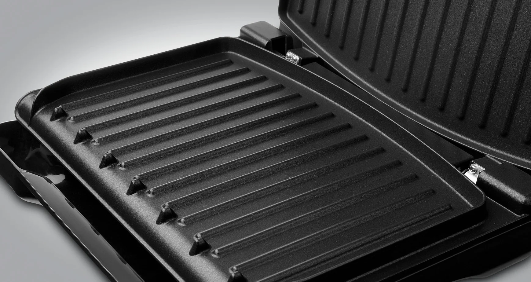 George Foreman grill elektryczny, redukujący ilość tłuszczu, wyjmowane płyty z powłoką nieprzywierającą, ruchome zawiasy, moc 1200W, czerwony, Steel Compact 25030-56