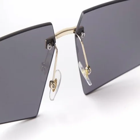 Modne 2024 unikalne duże kwadratowe okulary przeciwsłoneczne bez oprawek damskie Retro metalowe bezramowe odcienie okulary modne męskie okulary przeciwsłoneczne UV400