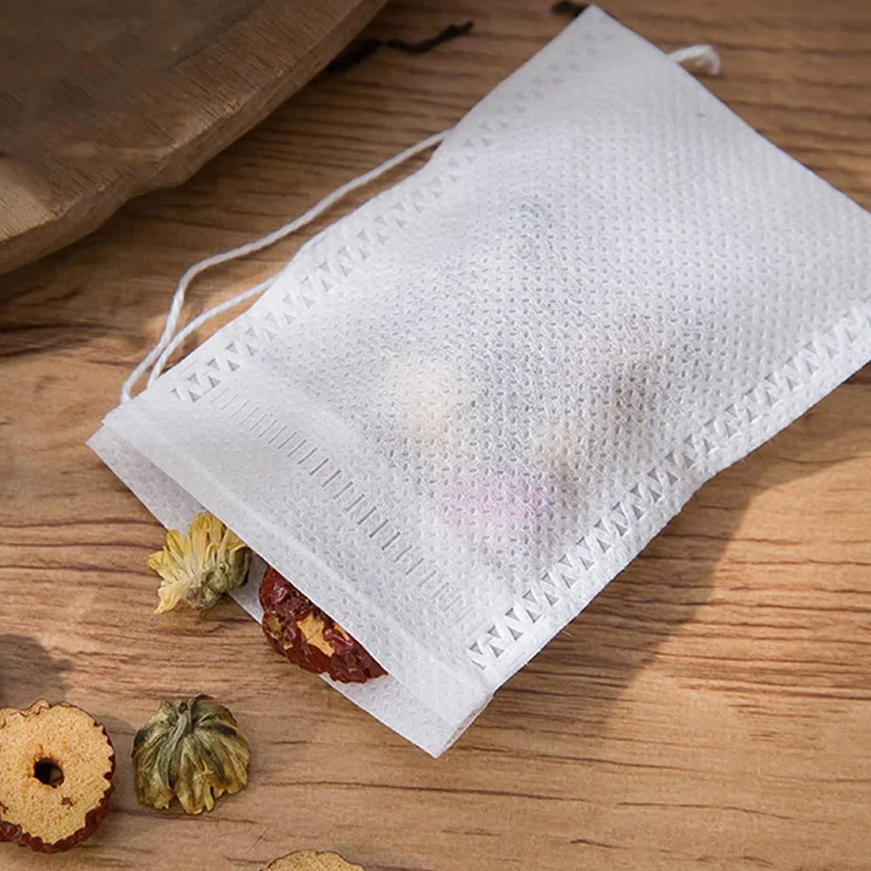 Yoosso 100 sztuk torebek filtrujących do herbaty 9 x 7 cm puste ze ściągaczem