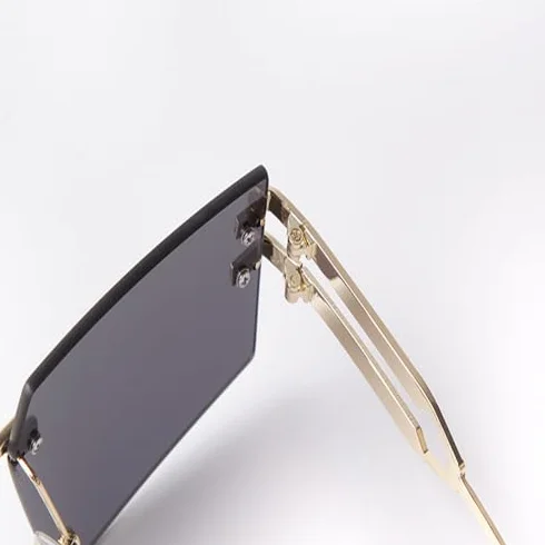 Modne 2024 unikalne duże kwadratowe okulary przeciwsłoneczne bez oprawek damskie Retro metalowe bezramowe odcienie okulary modne męskie okulary przeciwsłoneczne UV400