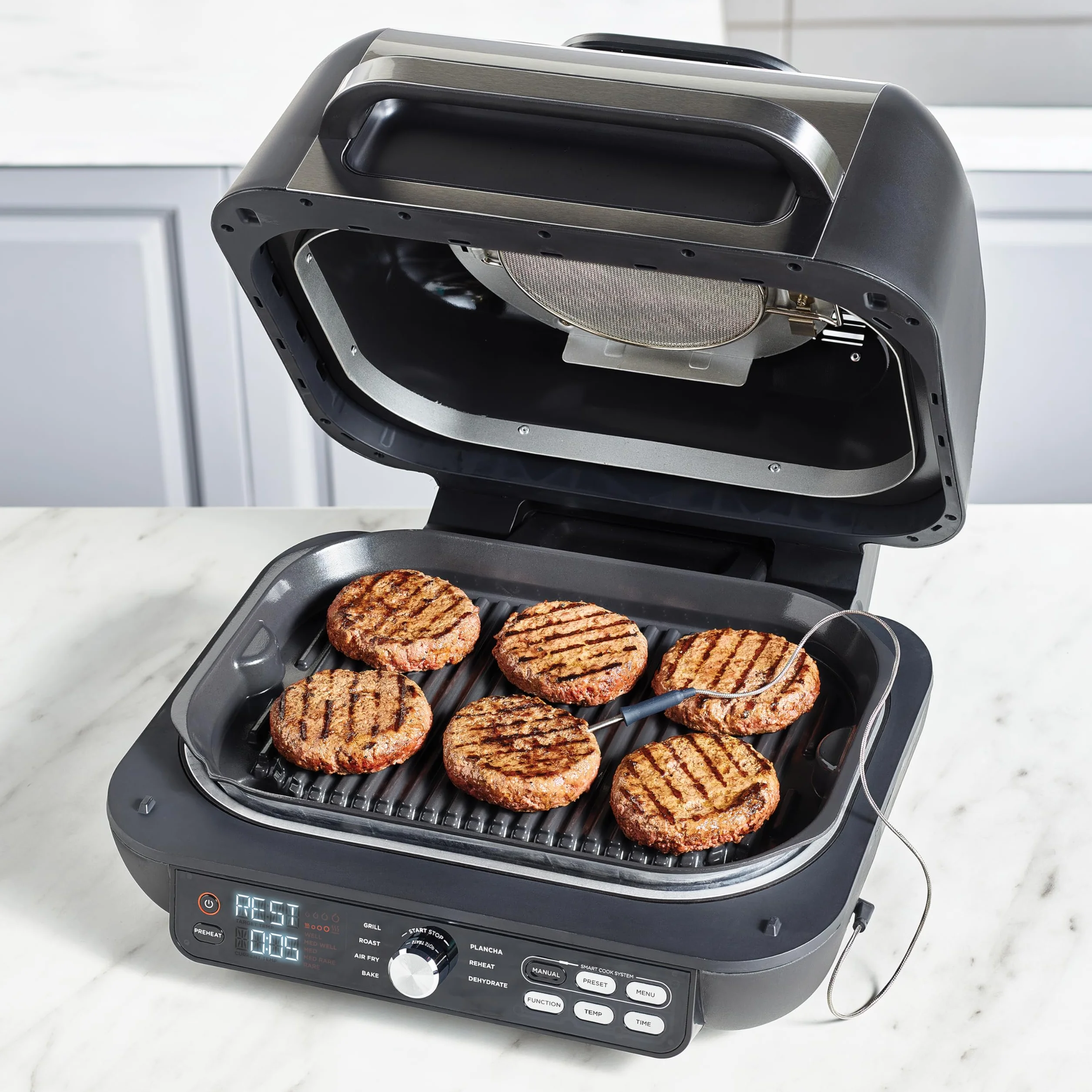 Ninja Foodi MAX PRO Grill, płaska płyta i frytkownica beztluszczowa z cyfrową sondą kuchenną i termometrem, 3,8 l, 7 funkcji gotowania w 1, części można myć w zmywarce, srebrno/czarny, AG651EU