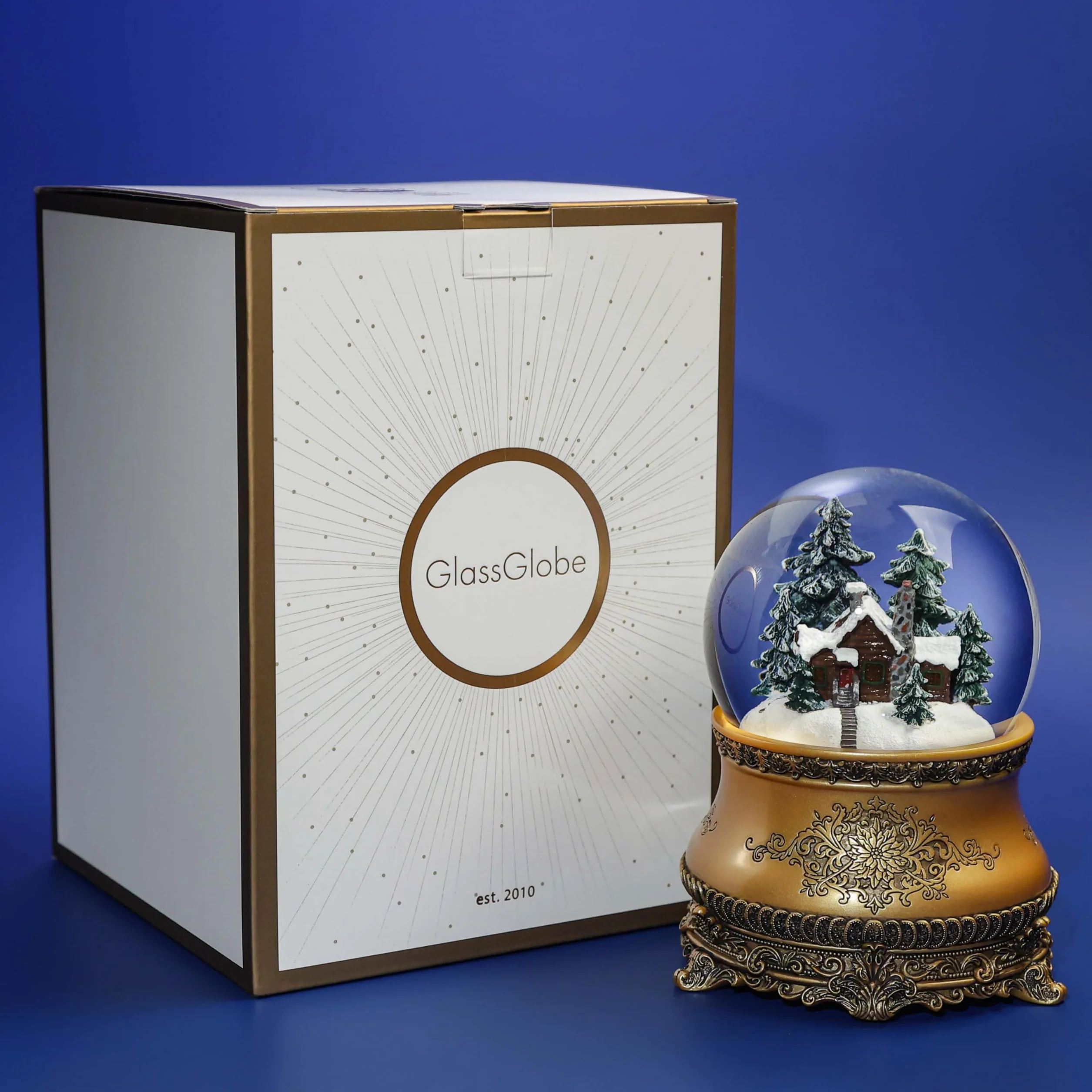 Świąteczna szklana kula śnieżna «Stary Dom» z podświetleniem LED okien, automatycznym opadem śniegu i pozytywką. Snow globe.