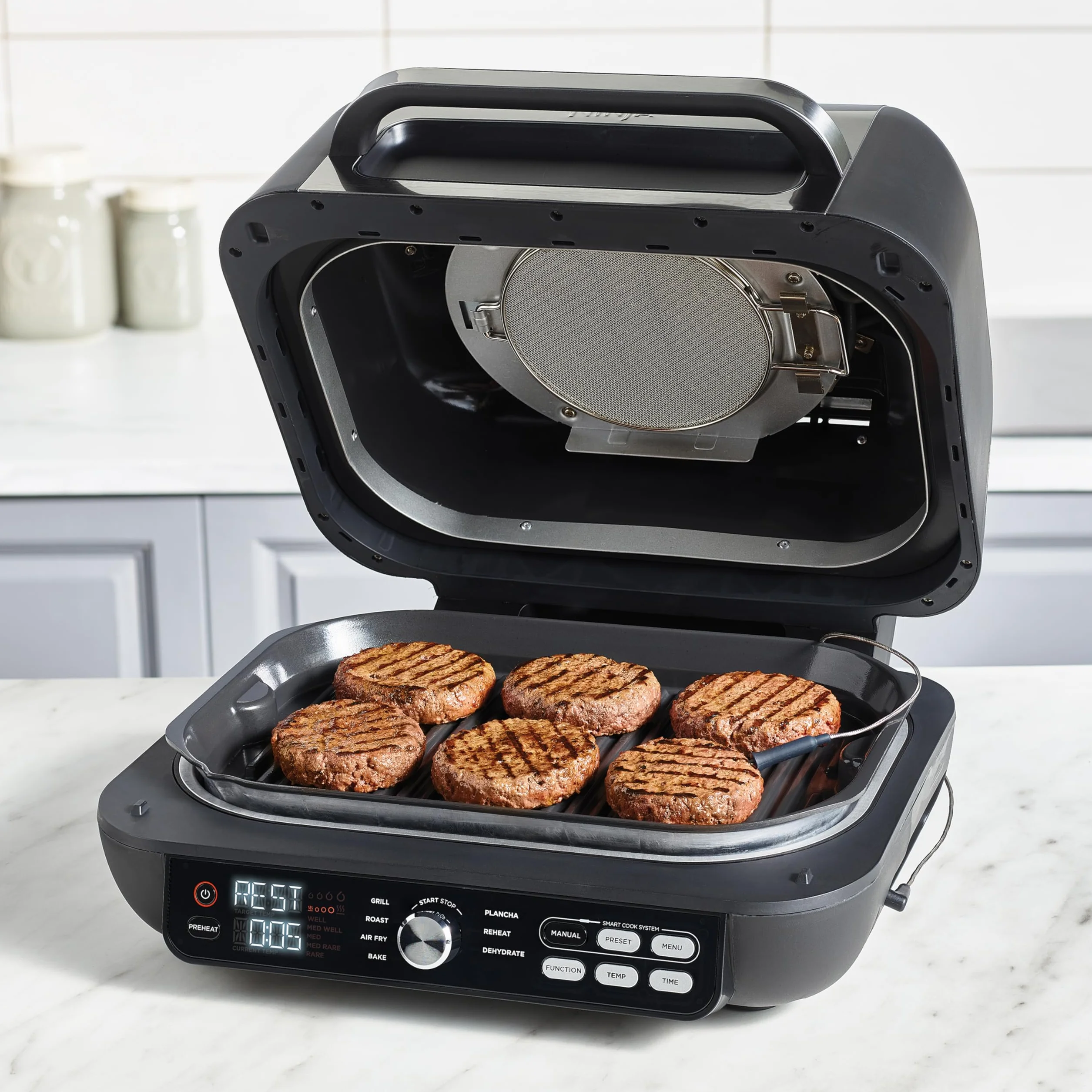 Ninja Foodi MAX PRO Grill, płaska płyta i frytkownica beztluszczowa z cyfrową sondą kuchenną i termometrem, 3,8 l, 7 funkcji gotowania w 1, części można myć w zmywarce, srebrno/czarny, AG651EU