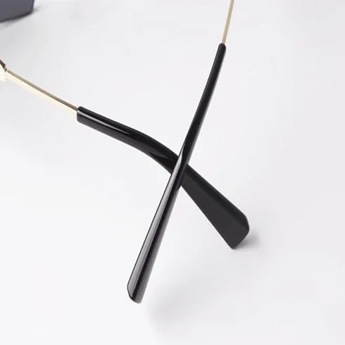Modne 2024 unikalne duże kwadratowe okulary przeciwsłoneczne bez oprawek damskie Retro metalowe bezramowe odcienie okulary modne męskie okulary przeciwsłoneczne UV400