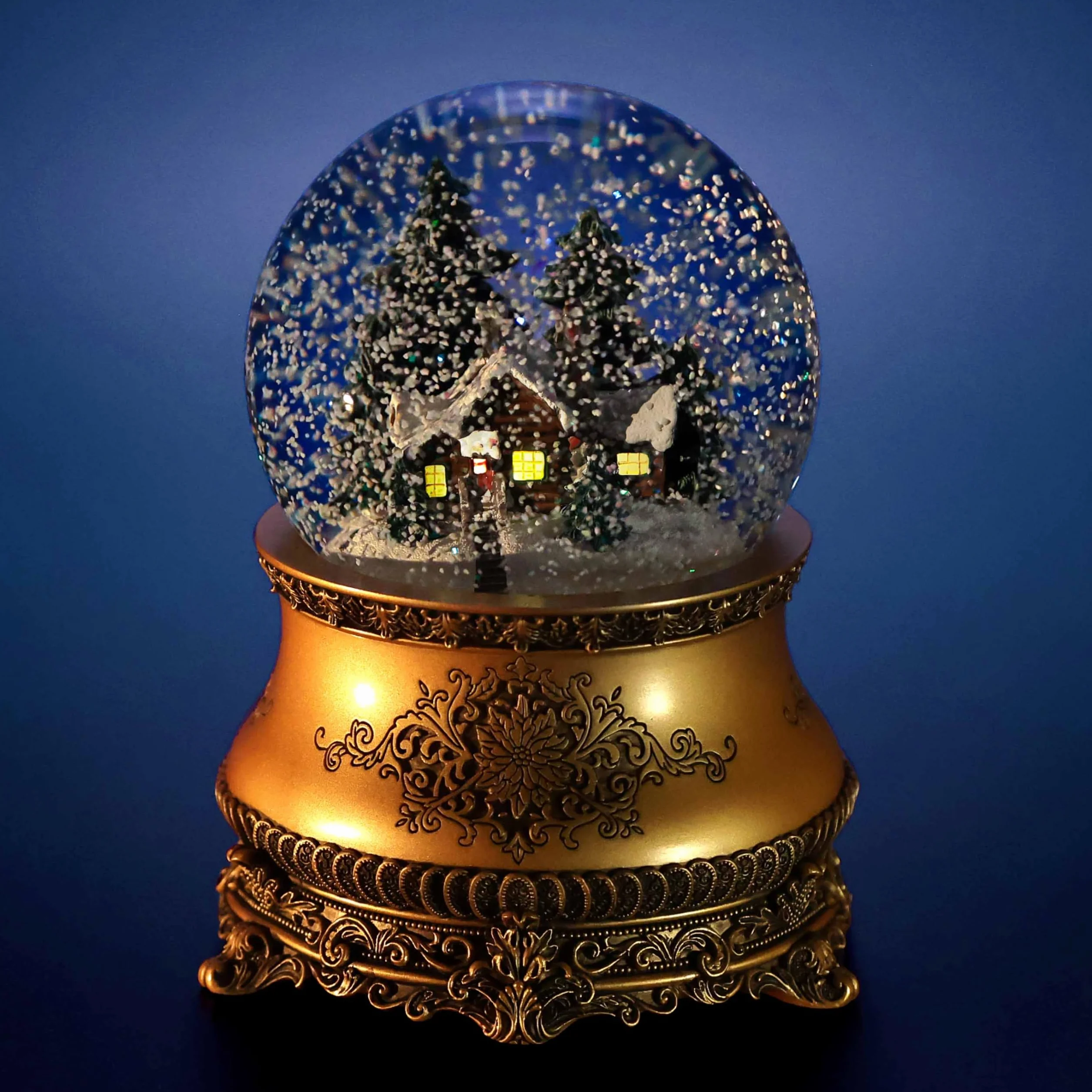 Świąteczna szklana kula śnieżna «Stary Dom» z podświetleniem LED okien, automatycznym opadem śniegu i pozytywką. Snow globe.